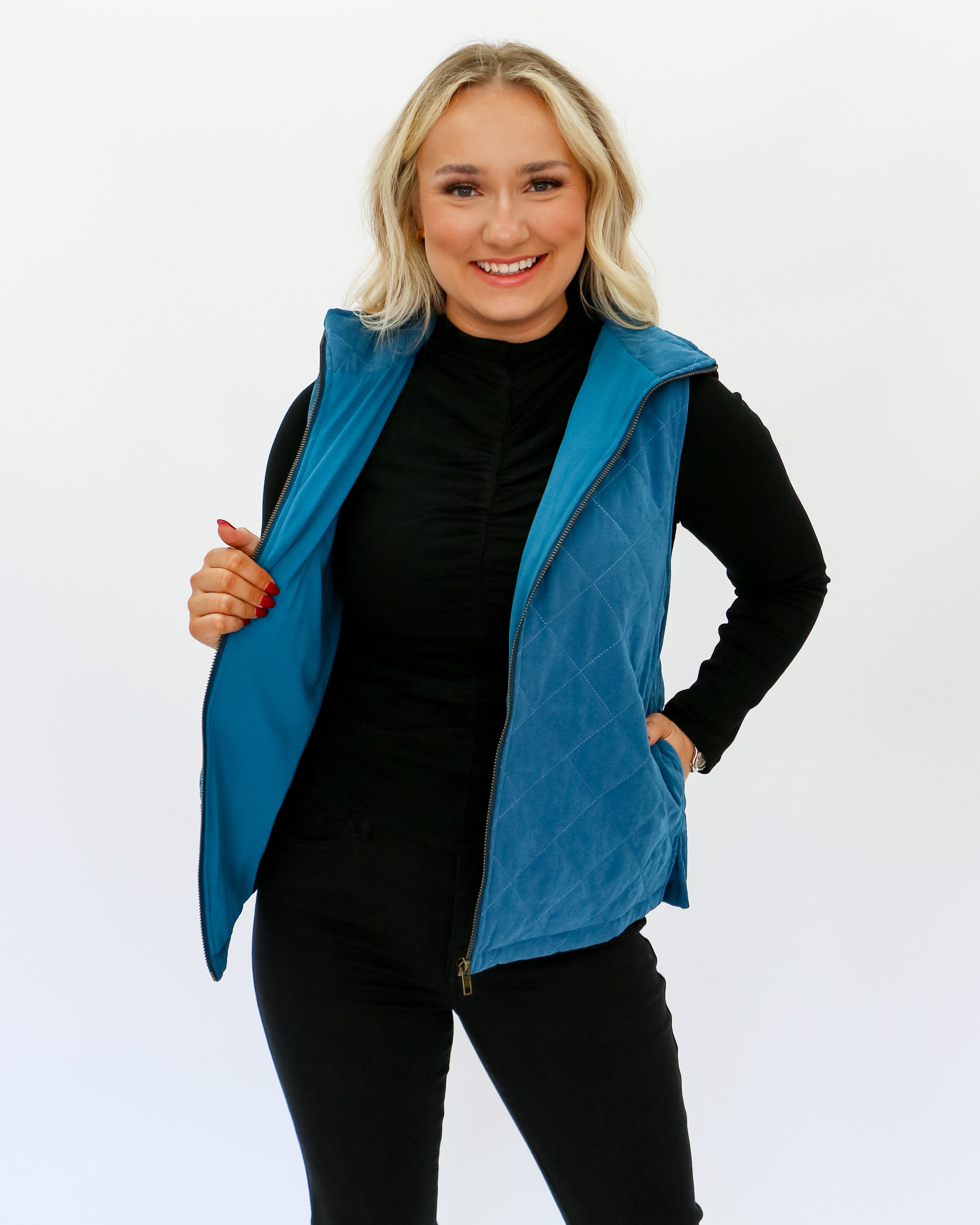 Sleeveless Quilted Vest in Teal Blue