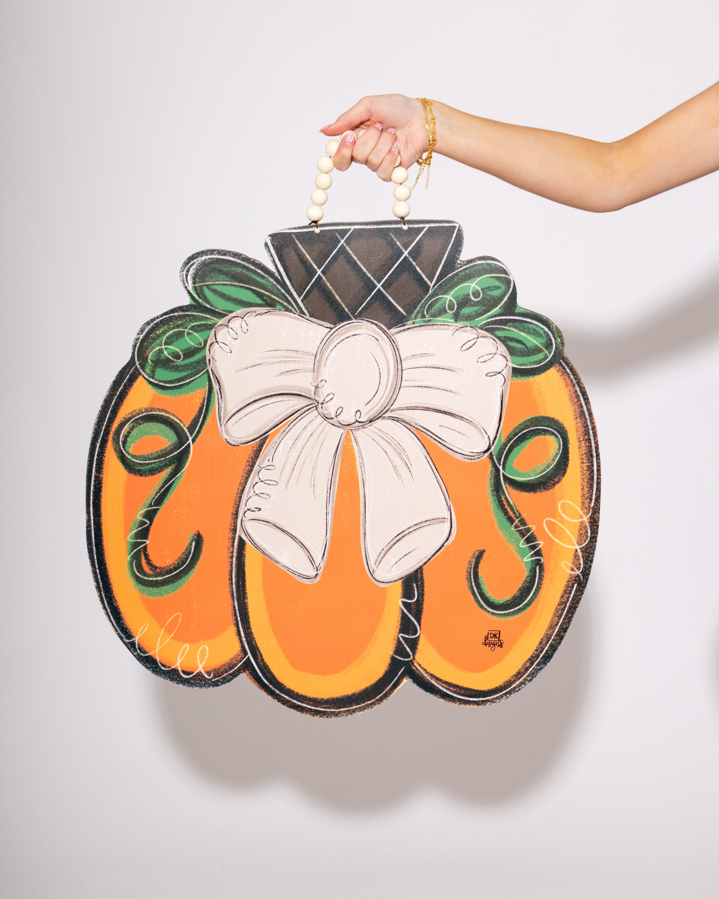 Tan Bow Pumpkin Door Hanger
