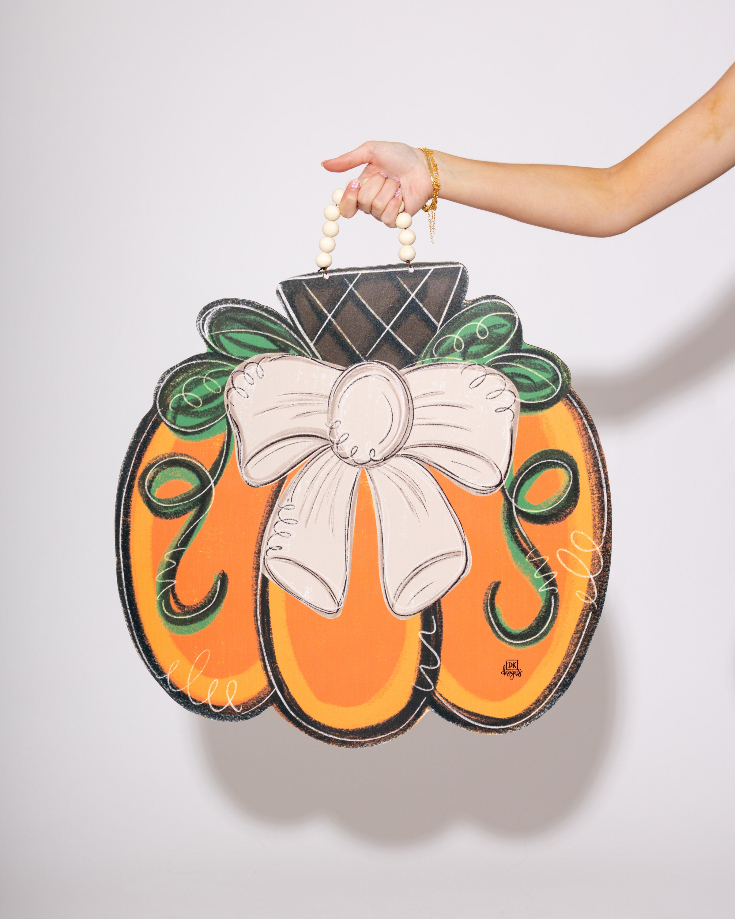 Tan Bow Pumpkin Door Hanger