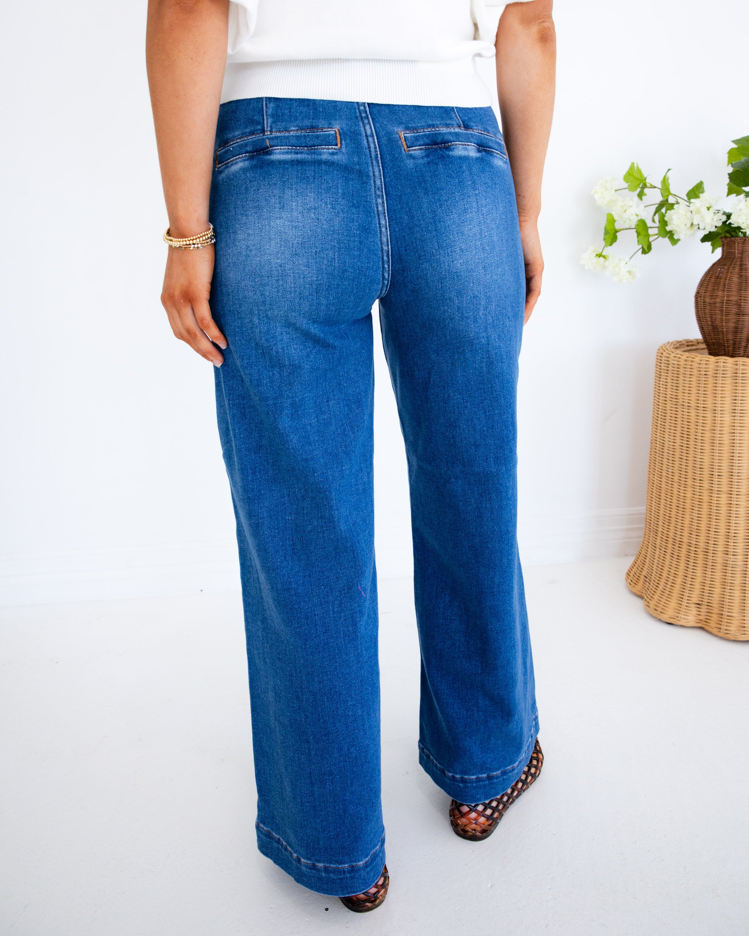 Risen | The Cali Flare Cropped Denim Jeans in Dark