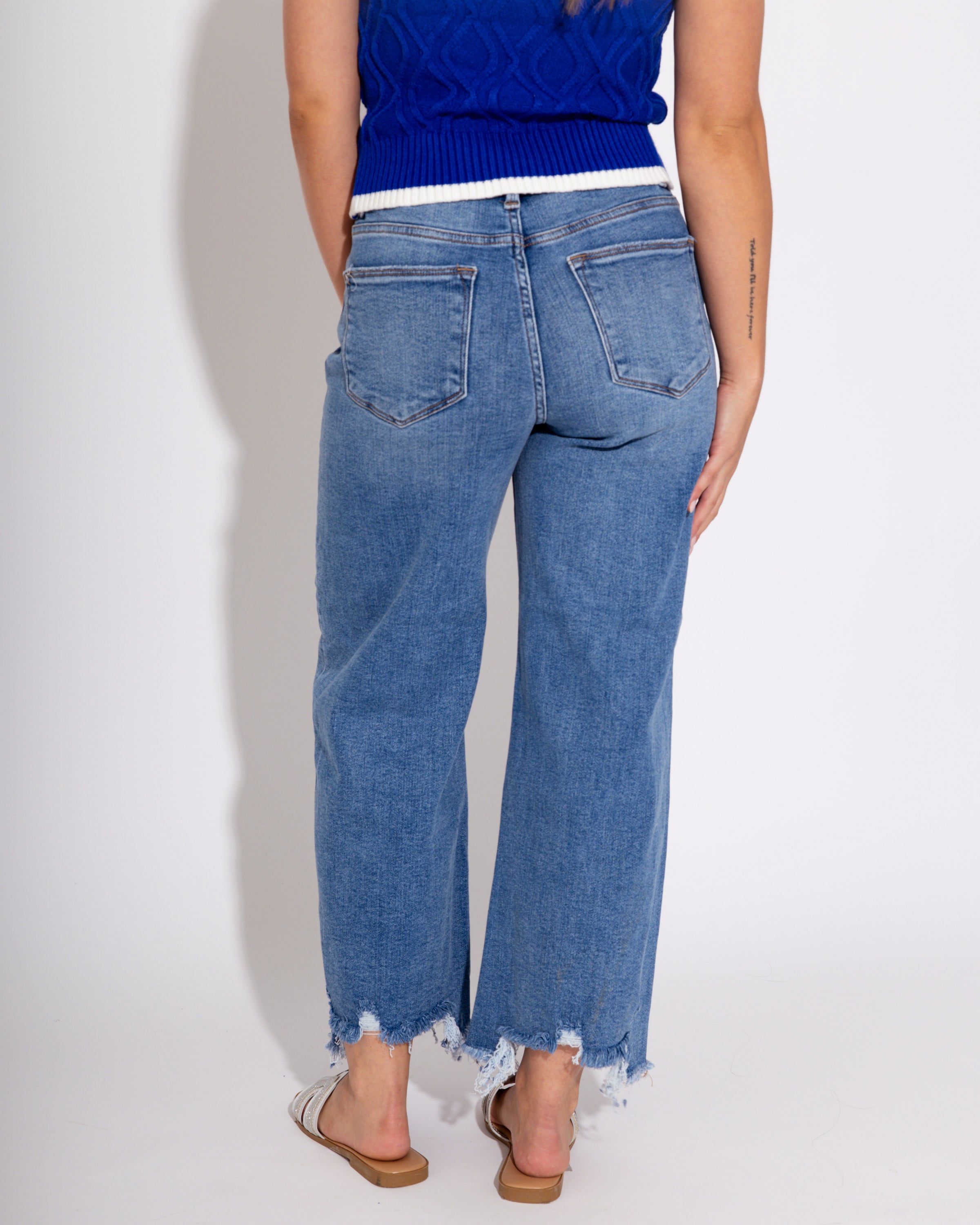 The Staggered Step Crop Jeans in Medium
