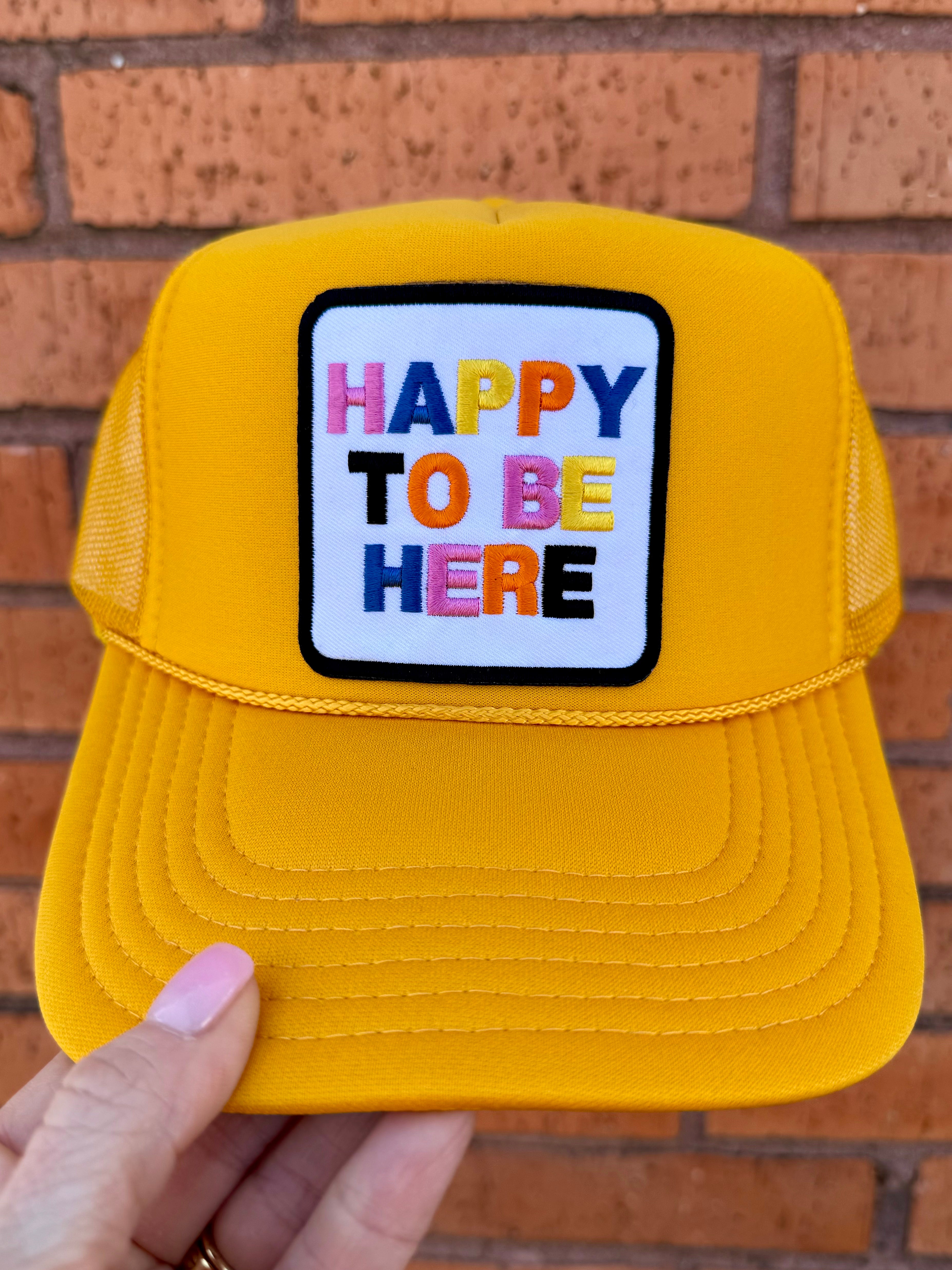 Happy To Be Here Trucker Hat In Yellow