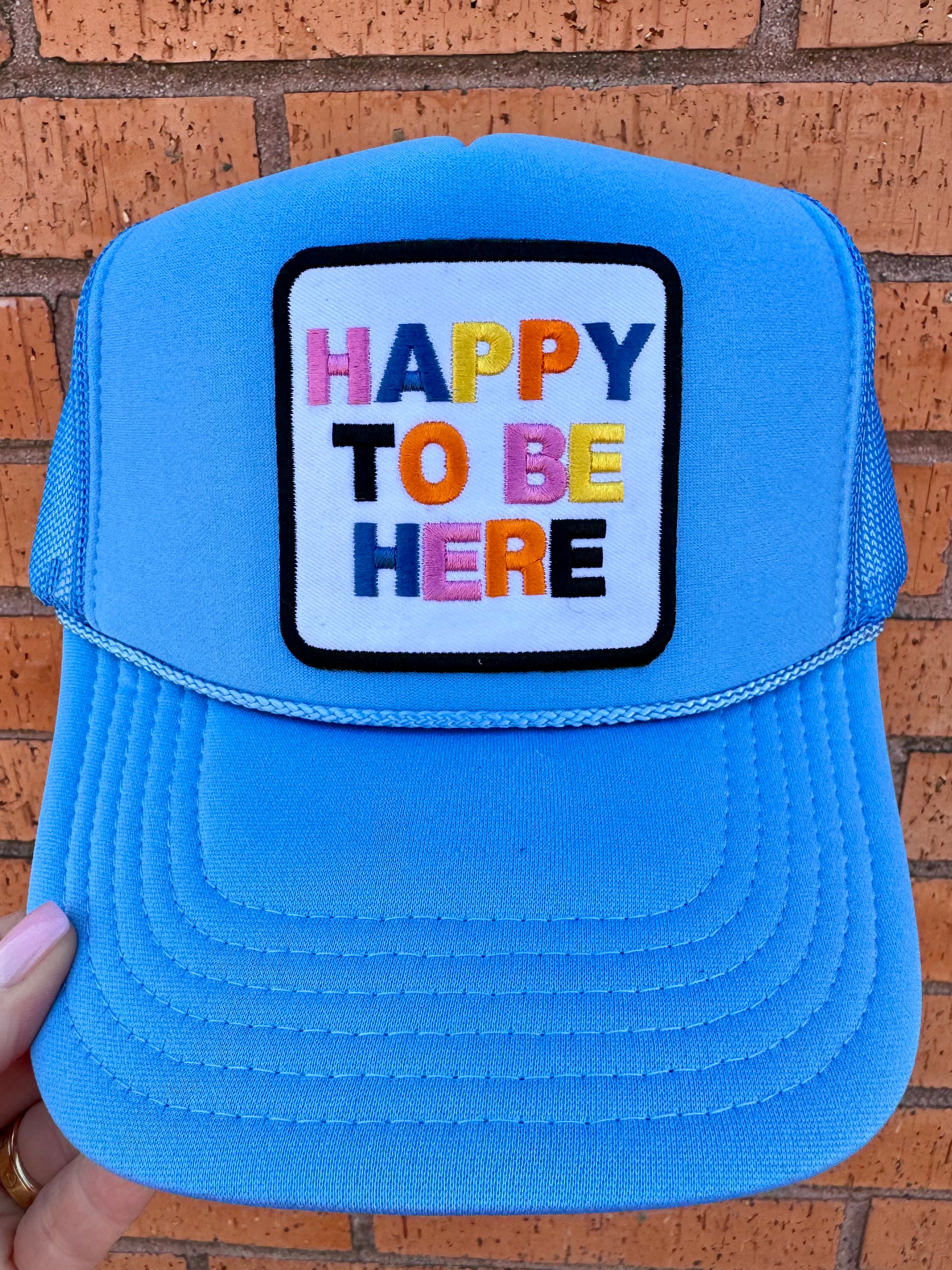 Happy To Be Here Trucker Hat In Blue