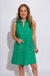 Green sleeveless mini dress with white contrast piping V-neck collar and front patch pockets, women's boutique dress at Gaudie & Co