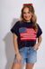Washed drop shoulder top with frayed American flag patch, women's patriotic casual boutique top at Gaudie & Co