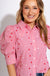 Red striped puff sleeve button-up blouse with star embroidery and ruffle cuffs, women's boutique top at Gaudie & Co