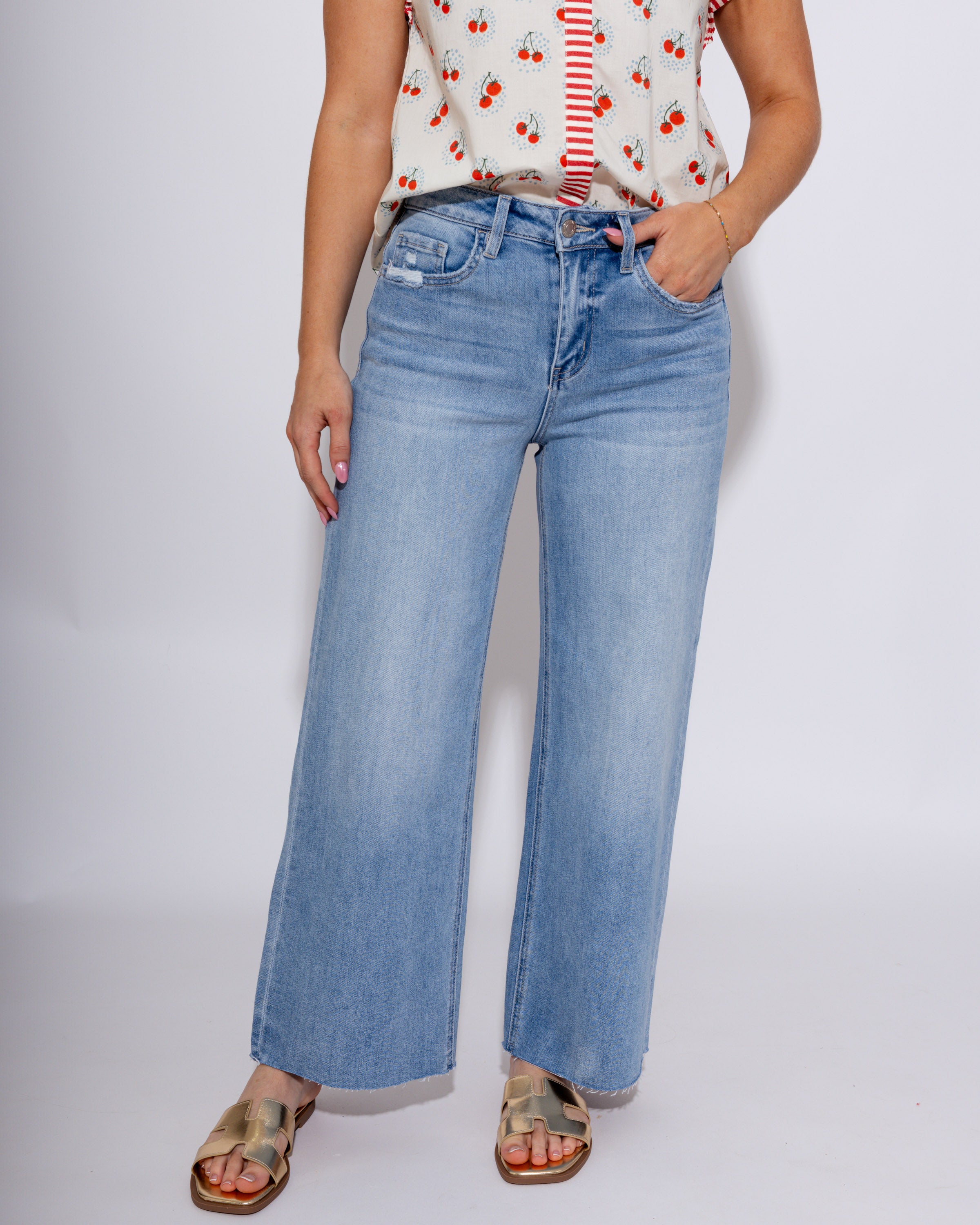 Vervet high rise light wash cropped wide leg jeans with raw hem, boutique denim at Gaudie & Co