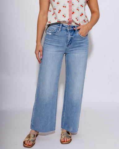 Vervet high rise light wash cropped wide leg jeans with raw hem, boutique denim at Gaudie & Co