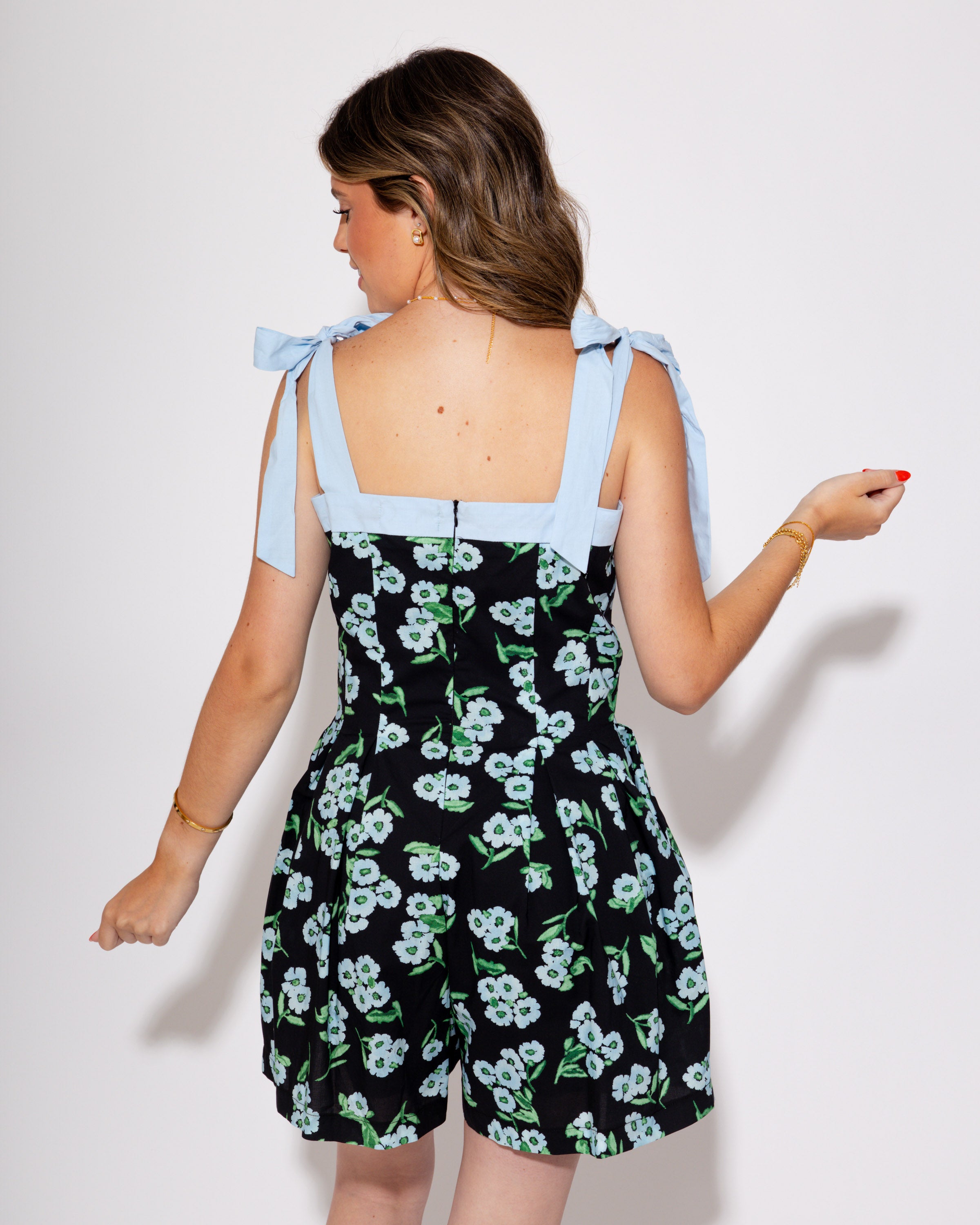 Petals & Pleats Romper in Black