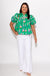 Green illustrated novelty print puff sleeve top styled with denim, boutique outfit at Gaudie & Co