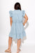 Denim tie waist mini dress styled with sneakers, casual summer outfit at Gaudie & Co