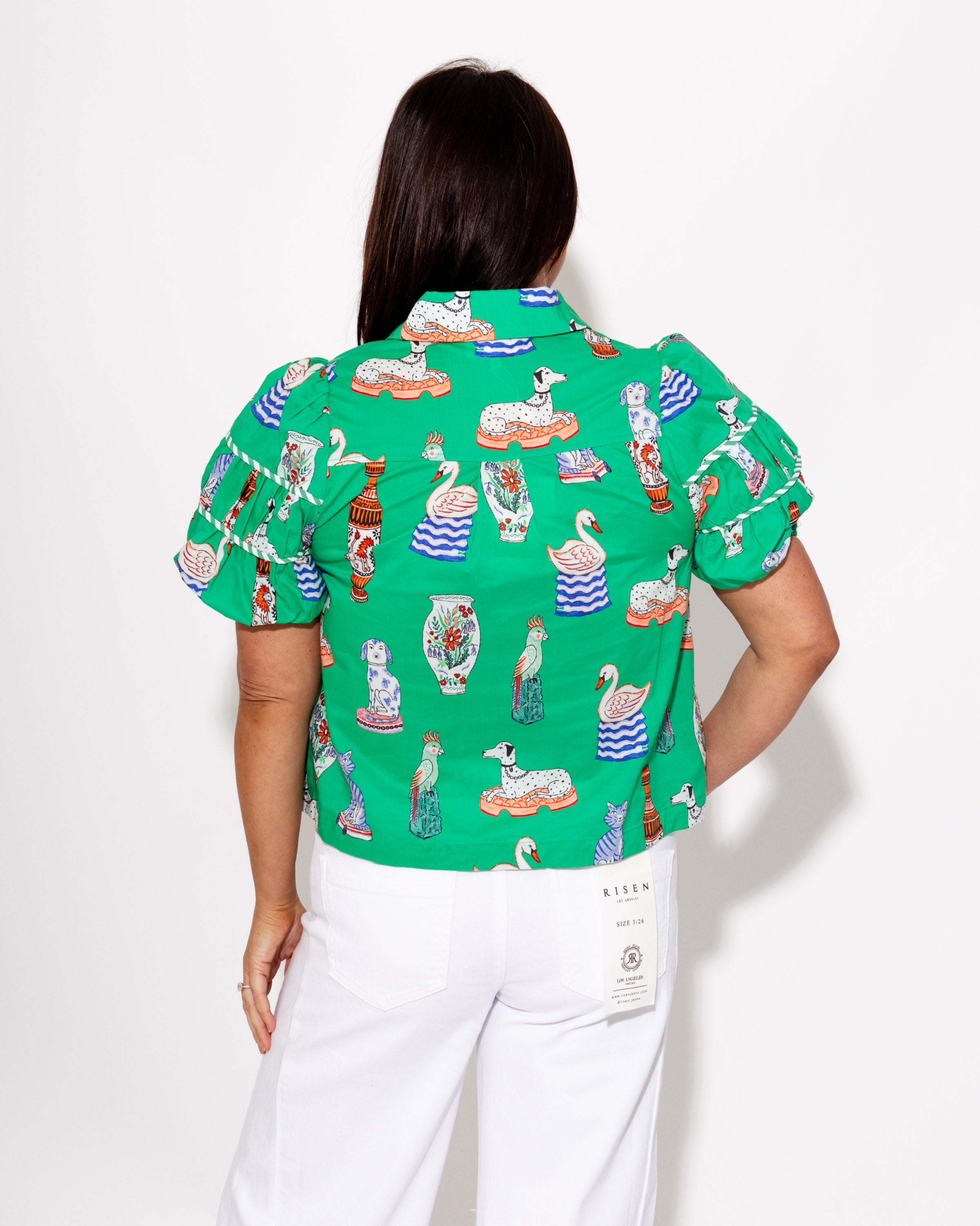 Illustrated novelty print puff sleeve top back view, boutique blouse at Gaudie & Co
