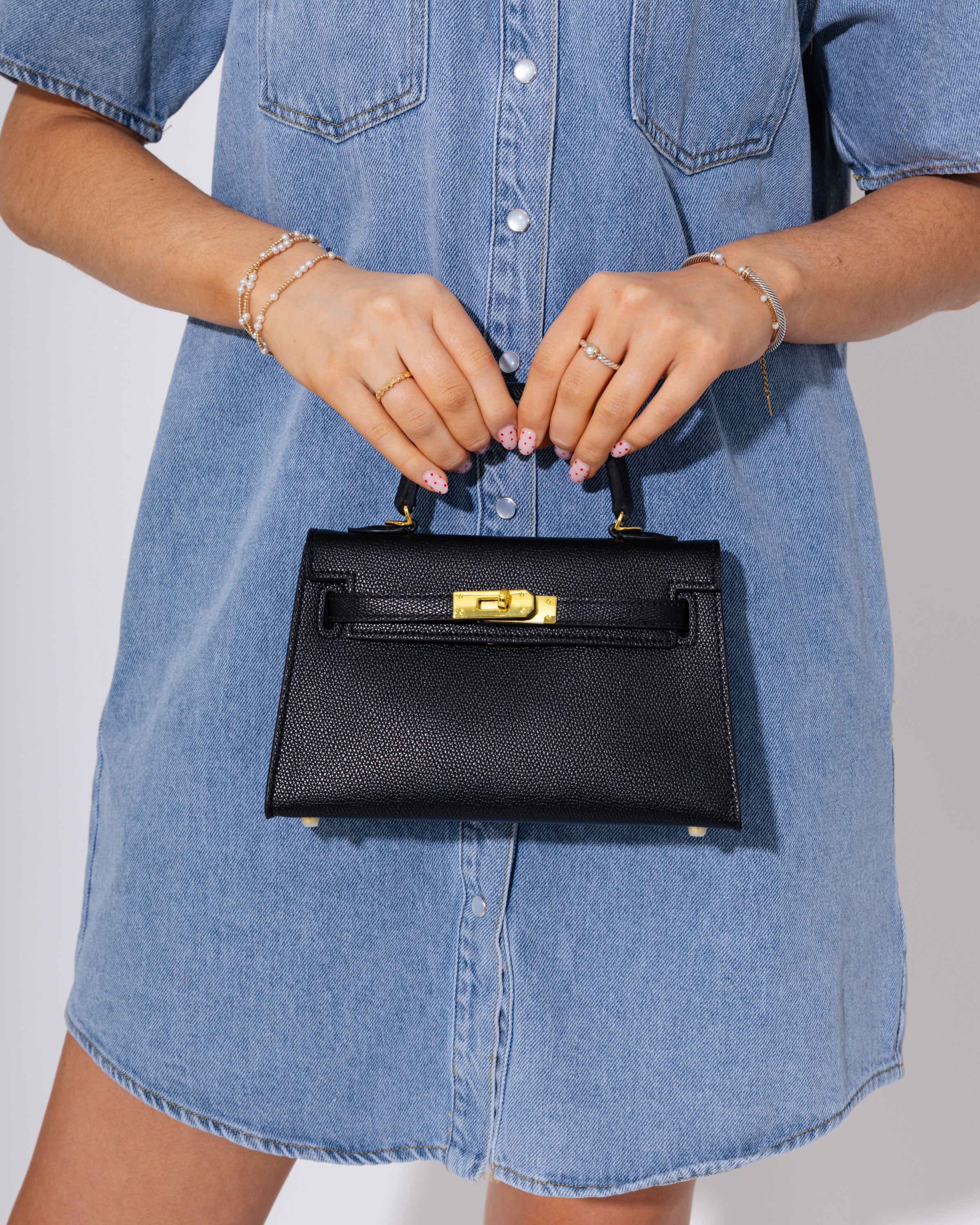 Mini Statement Handbag in Black