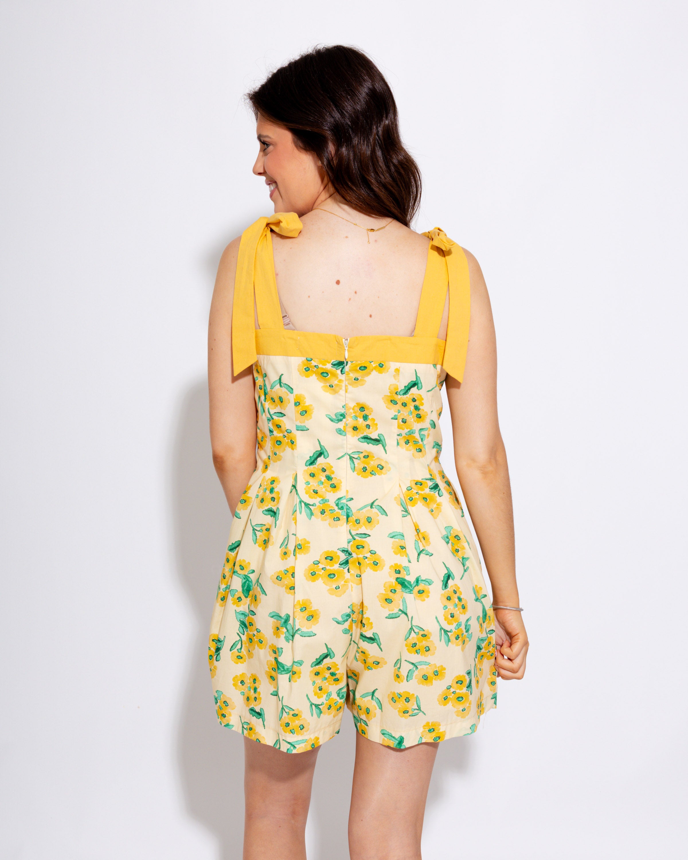 Petals & Pleats Romper in Custard