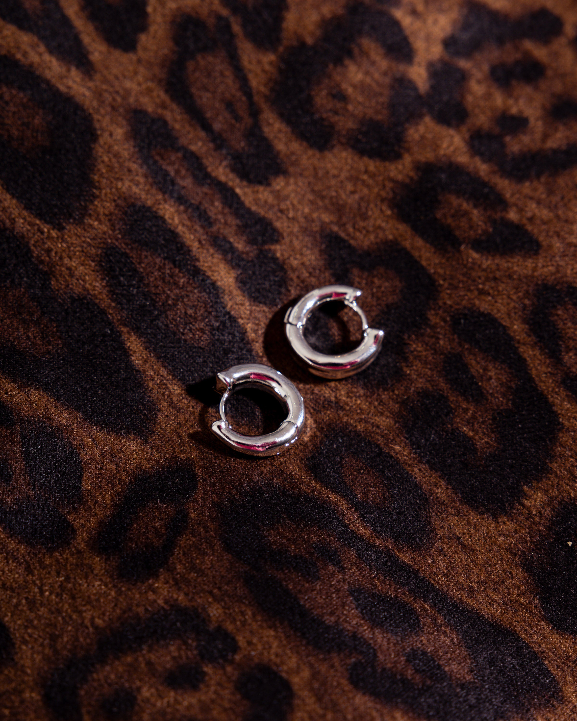 Gleam Huggie Hoops in Silver