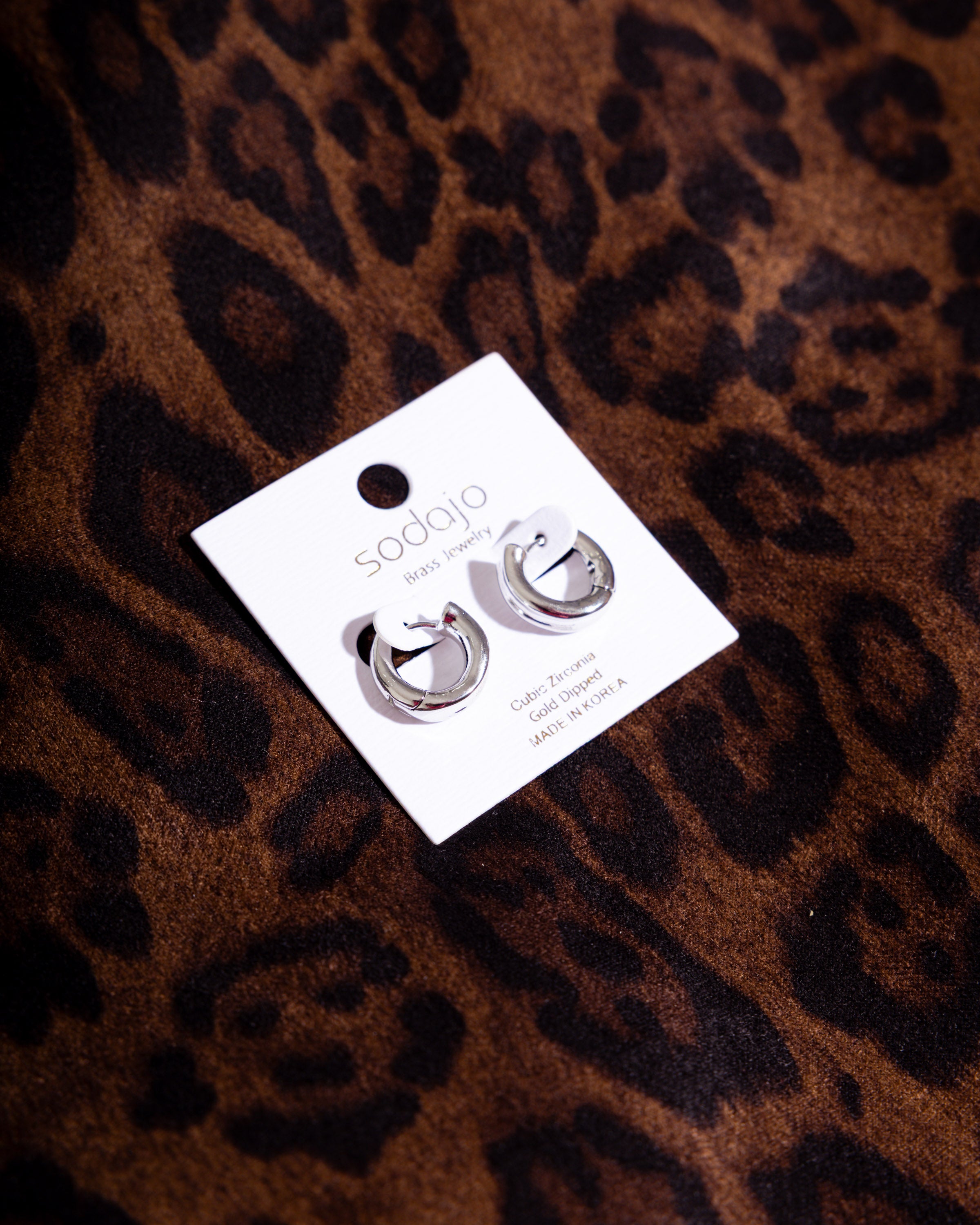 Gleam Huggie Hoops in Silver