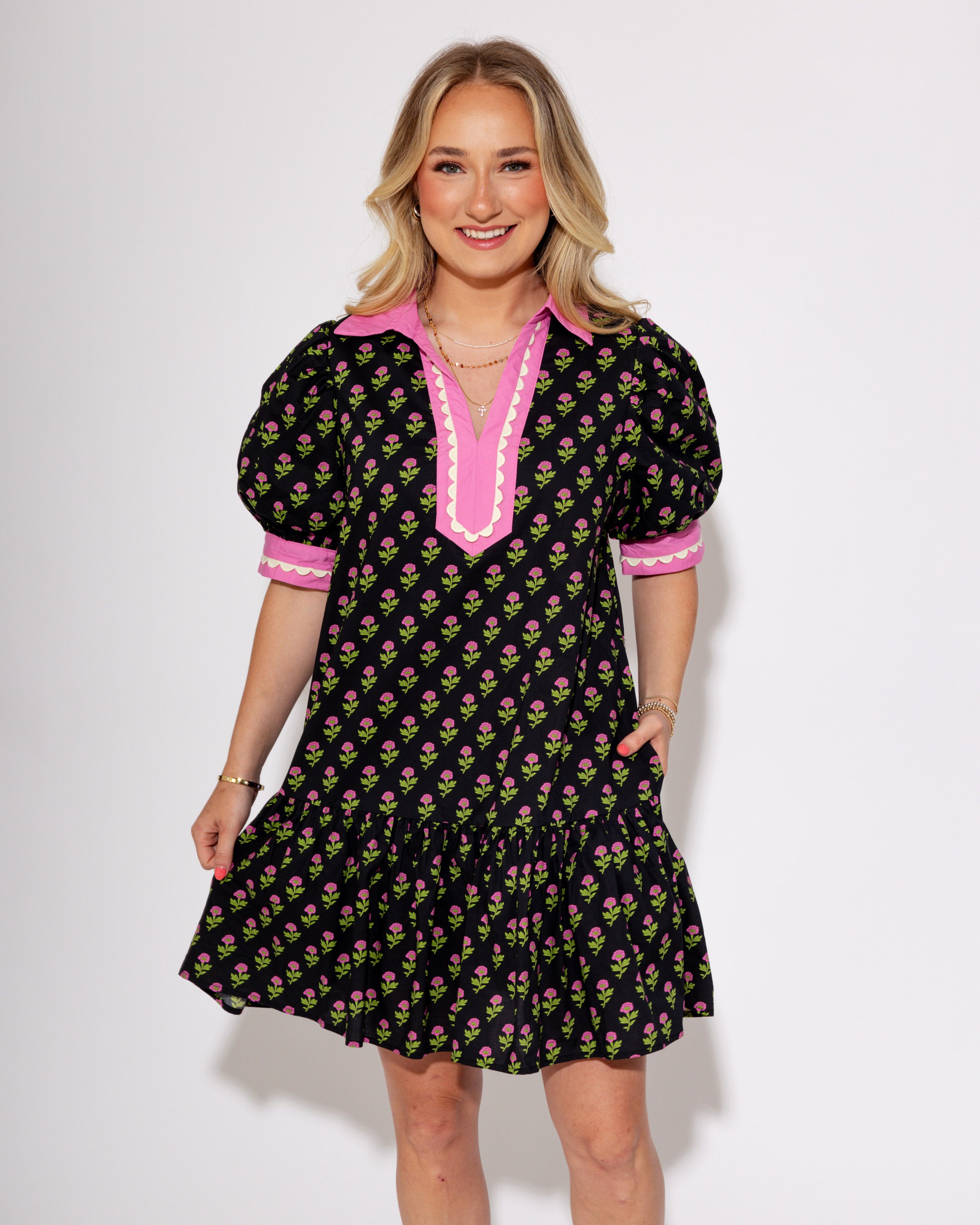 The Floral Flounce Mini Dress in Black