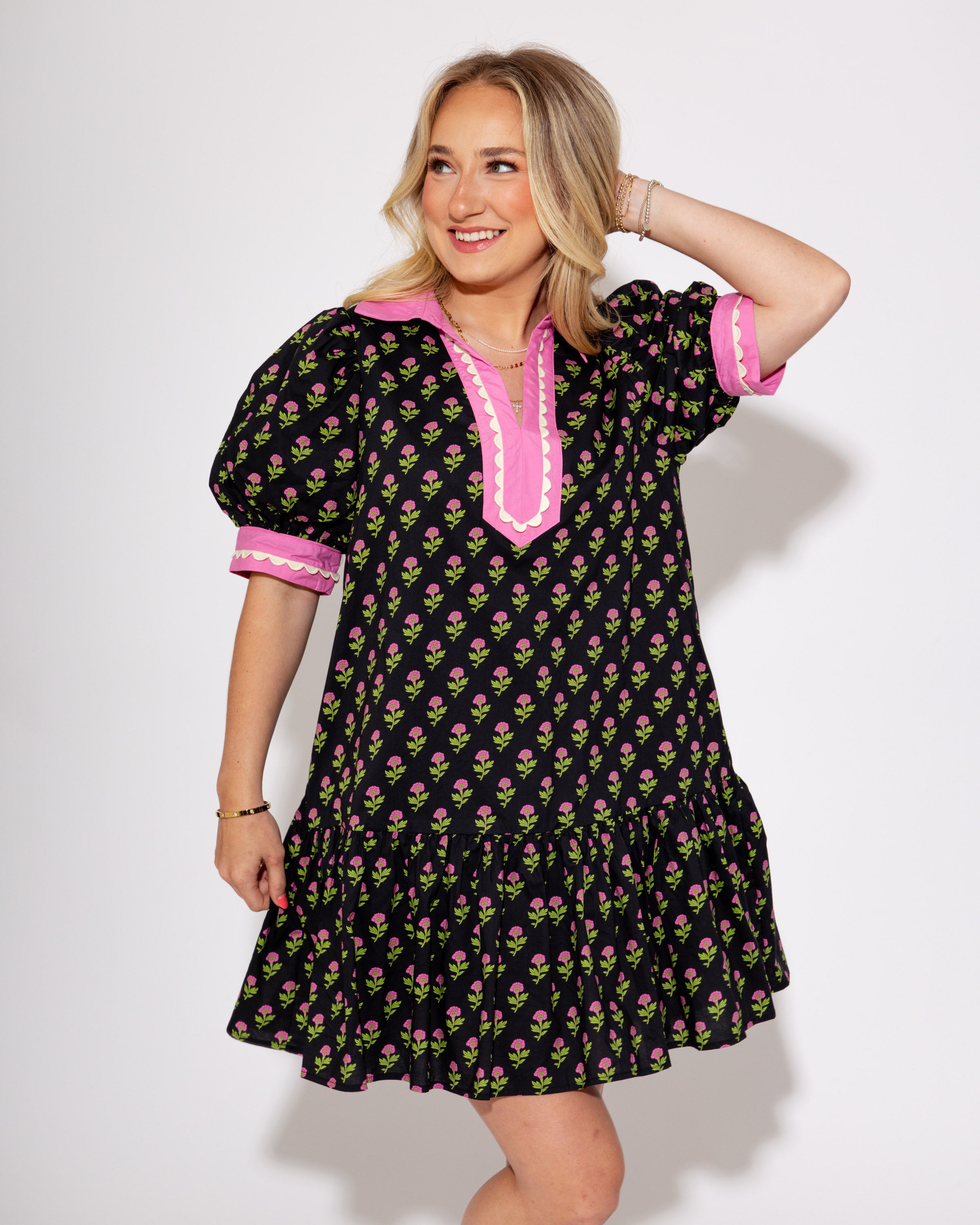 The Floral Flounce Mini Dress in Black