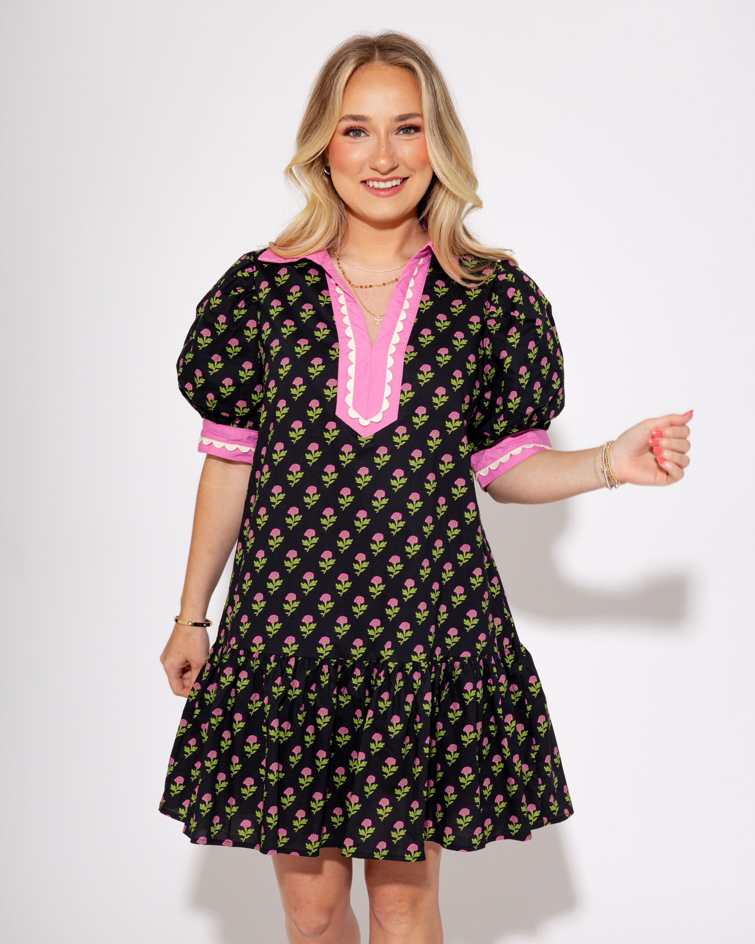 The Floral Flounce Mini Dress in Black