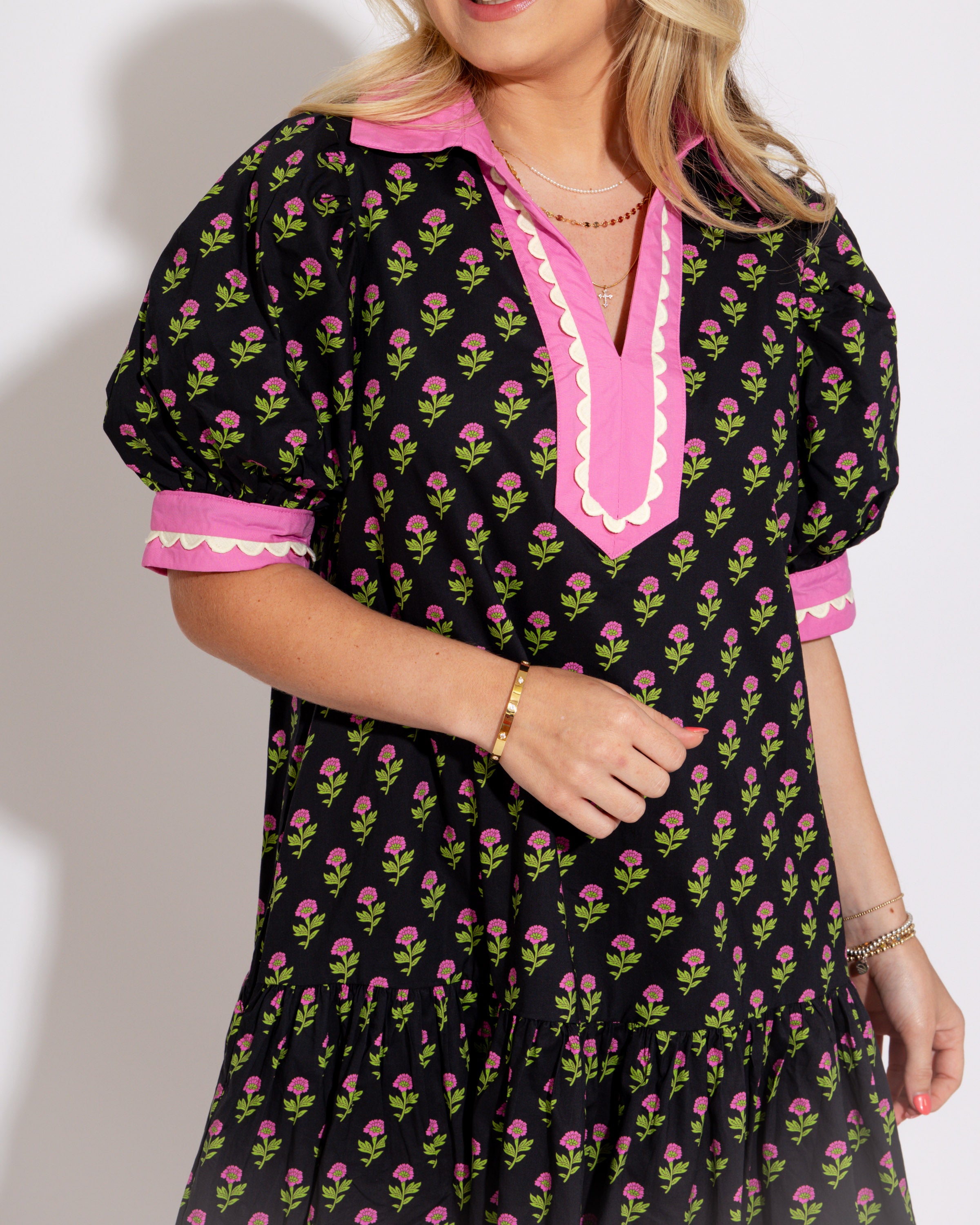 The Floral Flounce Mini Dress in Black