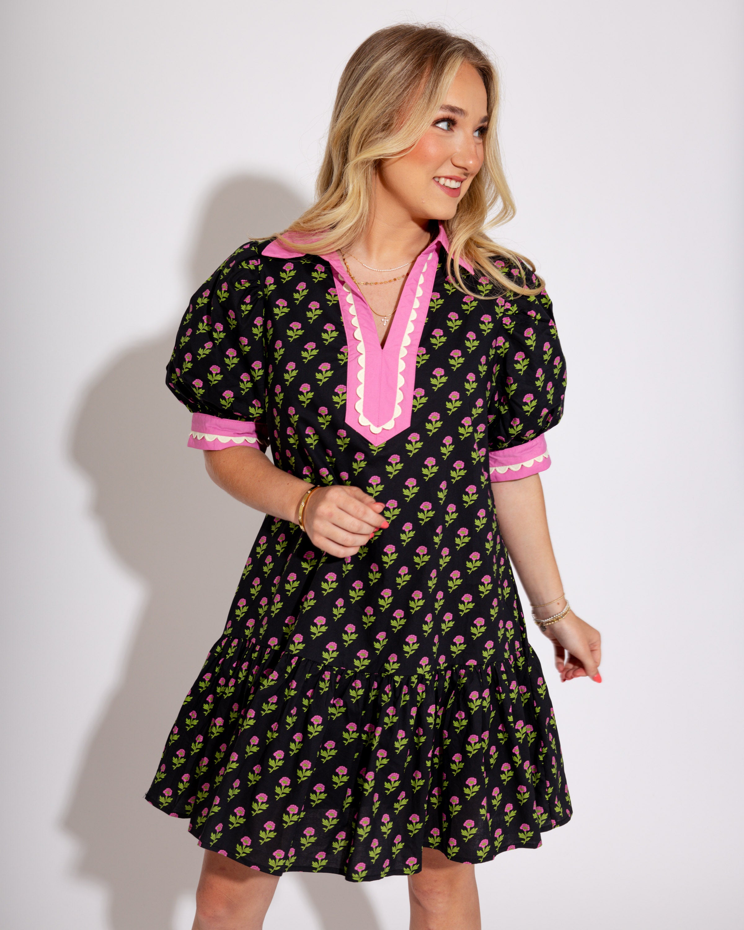 The Floral Flounce Mini Dress in Black