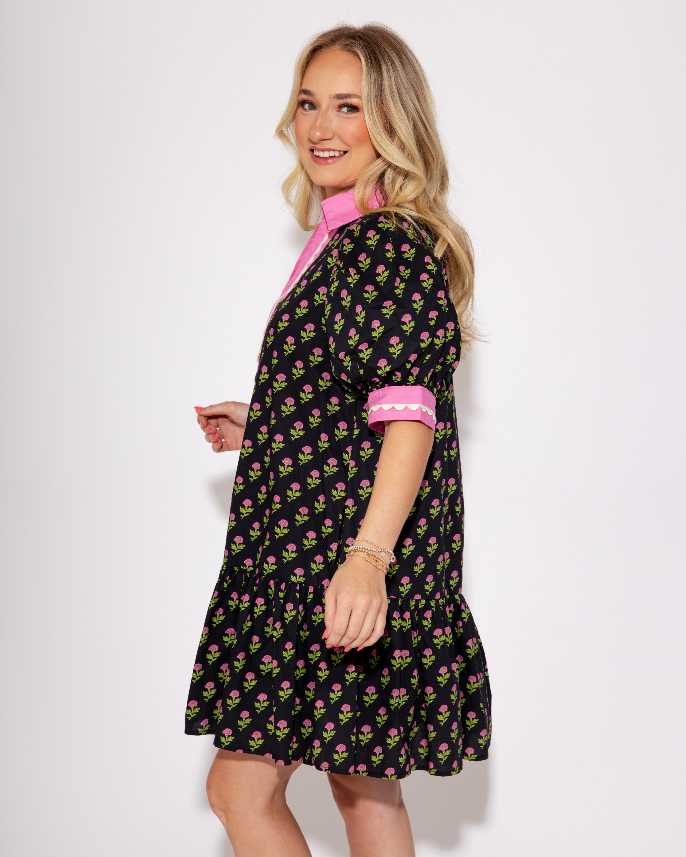 The Floral Flounce Mini Dress in Black