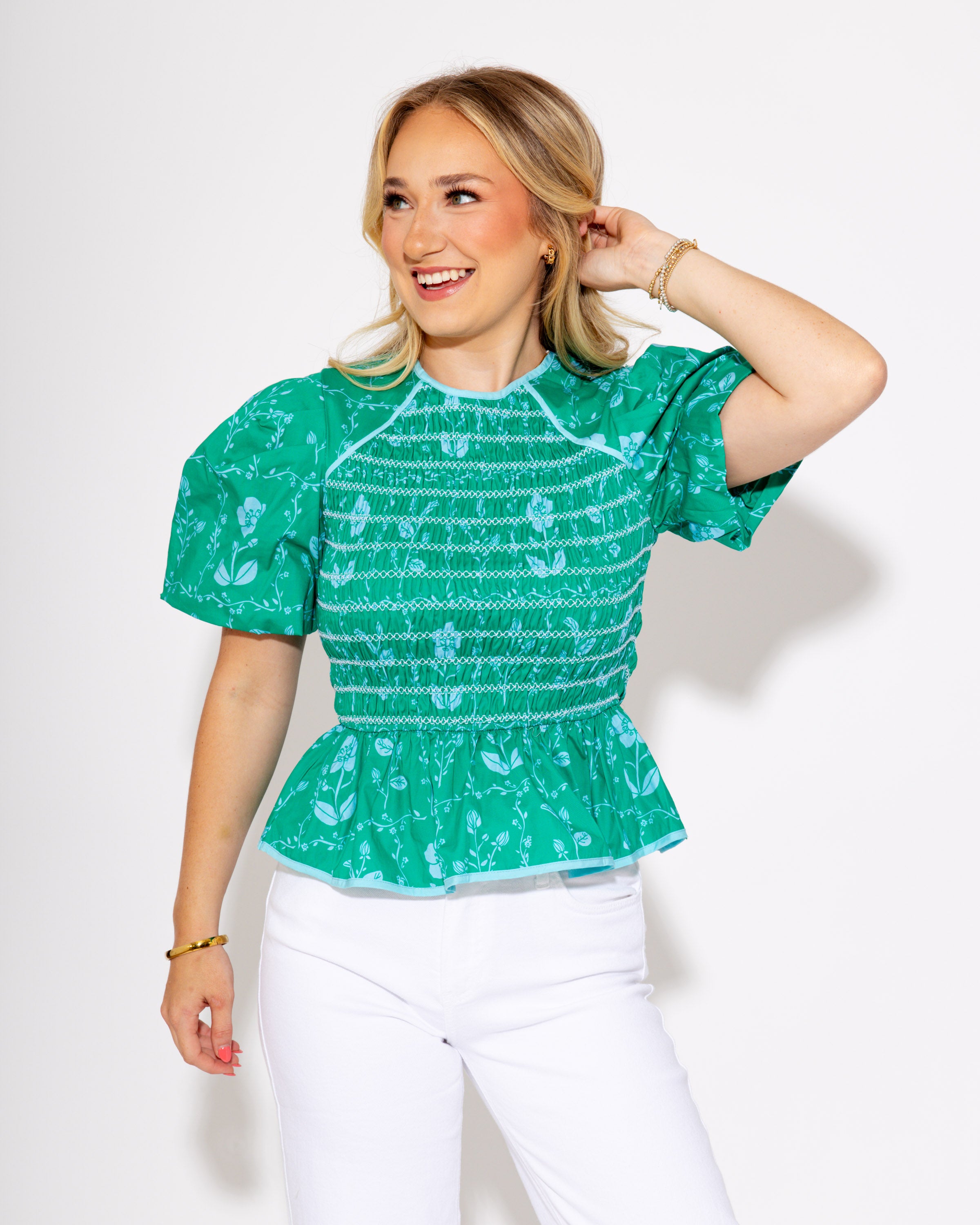 The Petal Pop Peplum Top