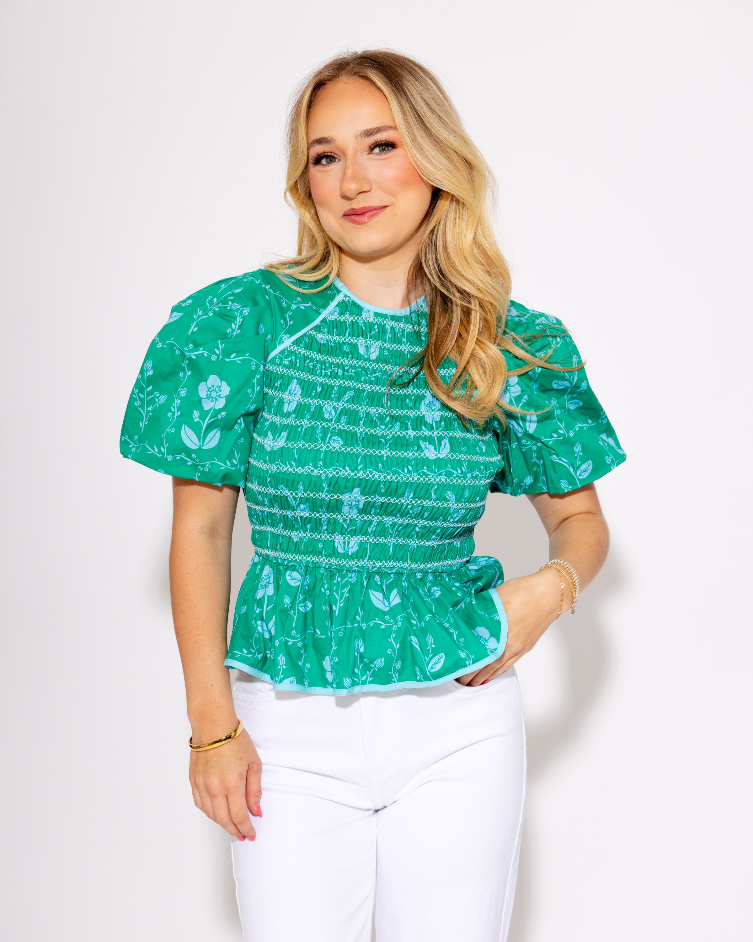 The Petal Pop Peplum Top