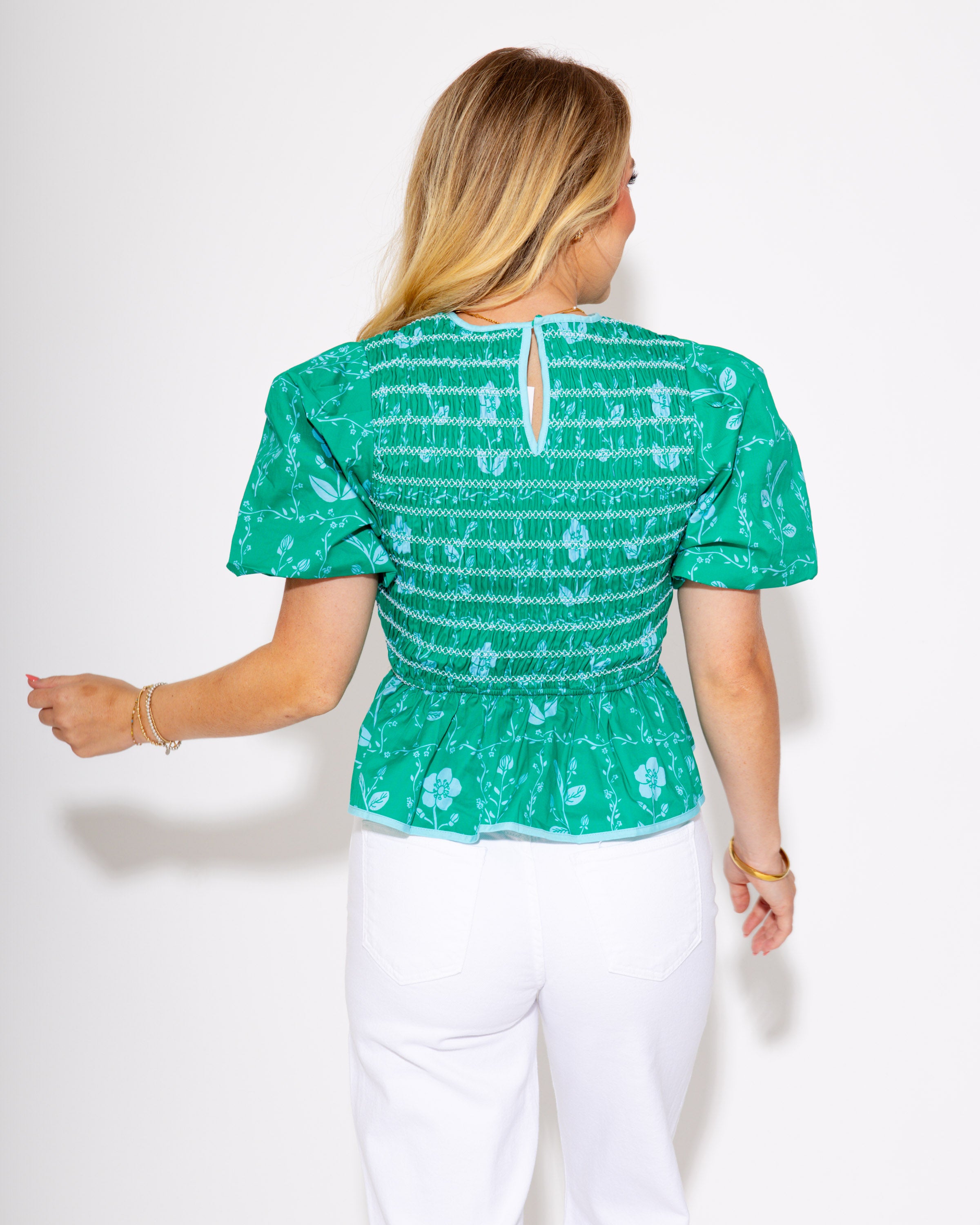 The Petal Pop Peplum Top