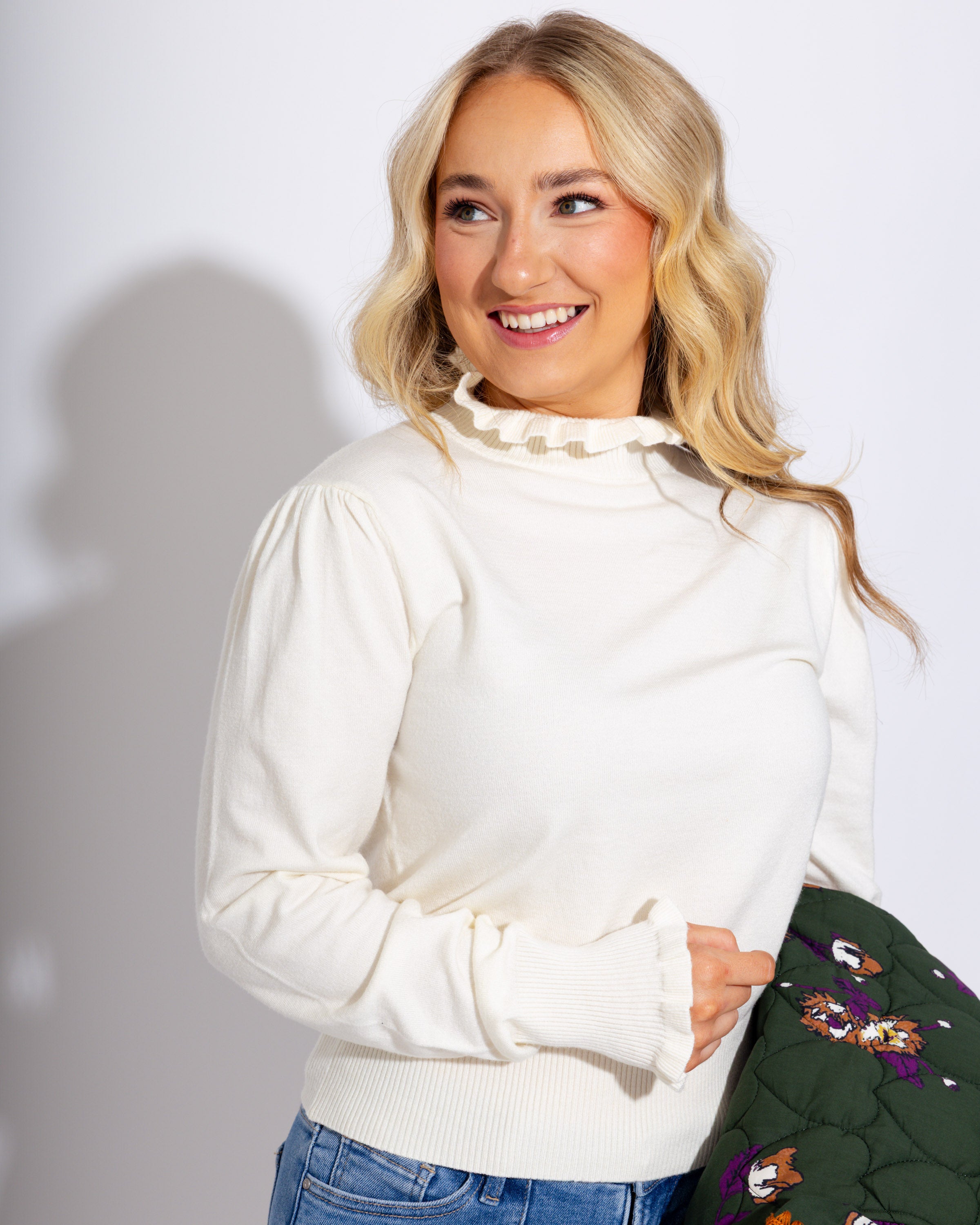 Ruffle Trim Mock Neck Sweater in Cream